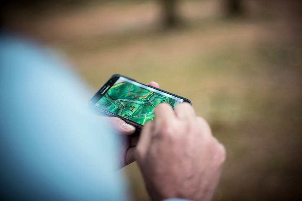 a person using a digital map on their phone