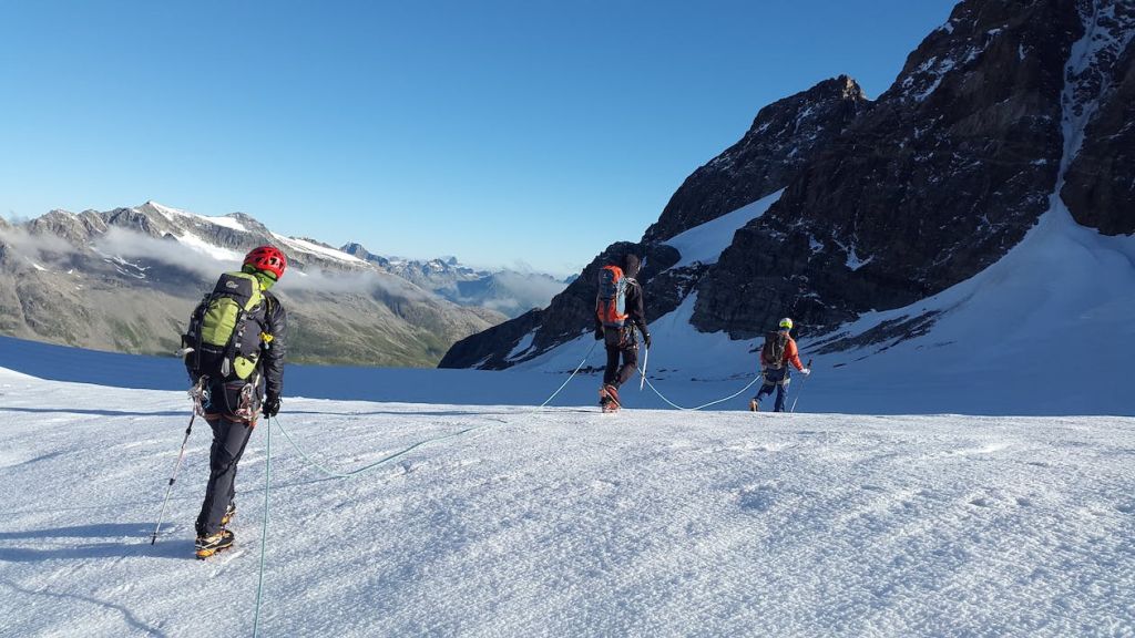 Climbers with tools on an ice climbing route